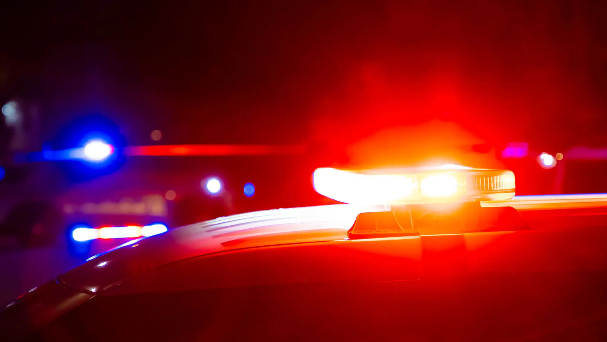 Flashing red and blue police lights.